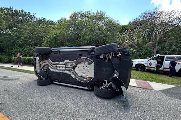 This photo provided by the Martin County Sheriff’s Office shows Tiger Woods’ overturned vehicle in Jupiter Island, Florida. 