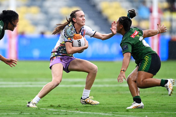 Tamika Upton carries the ball in the first half.