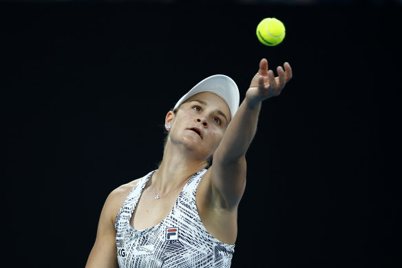 Ashleigh Barty serves against Italy’s Camila Giorgi.