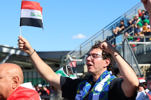 A supporter waits for Iraq’s first World Cup game in 40 years.