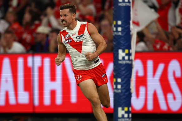 Jake Lloyd celebrates kicking a goal.