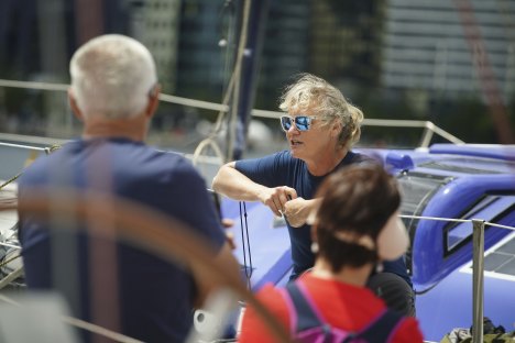 Pip Hare, on the deck of Medallia, chats to members of the public at Docklands.