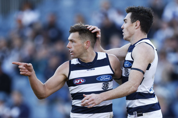 Cats players Shaun Higgins and Jeremy Cameron in the round 10 AFL match against the Gold Coast Suns. 