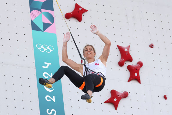 Aleksandra Miroslaw of Team Poland celebrates during the women’s speed climbing heats in Paris.