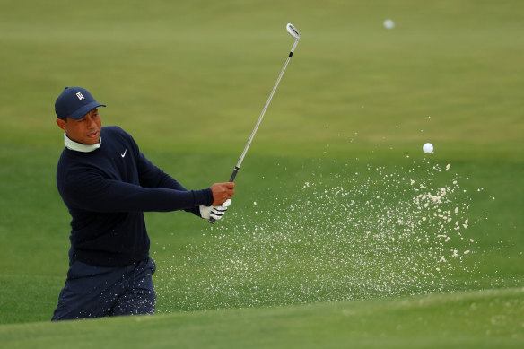Woods warms up on the range at Augusta on Tuesday.