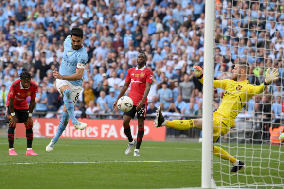 Ilkay Guendogan scores a goal past David De Gea of Manchester United, before being disallowed for offside during the FA Cup final.