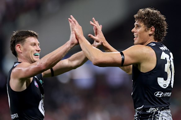 Sam Walsh and Charlie Curnow.