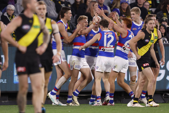 The Bulldogs celebrate another goal against the Tigers on Saturday night.