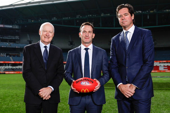 AFL Commission chair Richard Goyder, incoming CEO Andrew Dillon and outgoing chief Gillon McLachlan. Dillon is keen to bring in football experience. 