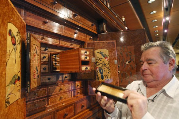 Geoff Hannah with the Hannah Cabinet, in a photo from 2010.