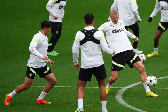 Alex Robertson (left) is training with the world’s best players, like Erling Haaland, every day.