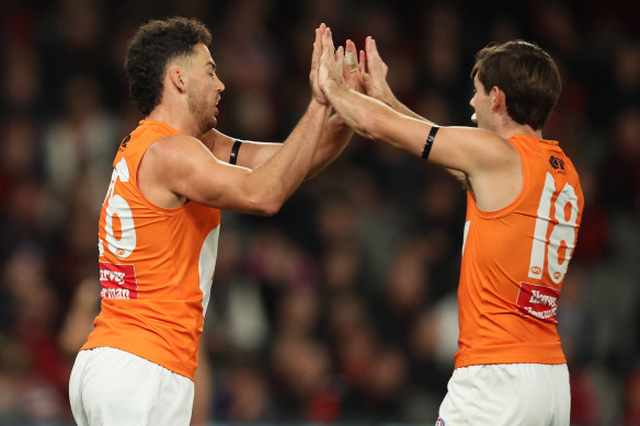 Essendon are interested in Giants utlility Conor Stone (right).