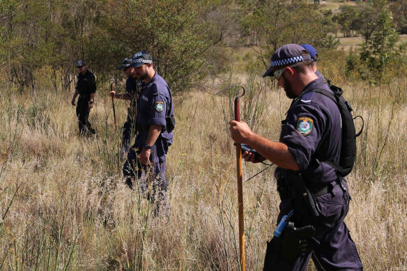 Police searching for evidence in relation to Carly McBride’s death, at Muswellbrook in 2015.