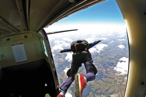 Adrenaline rush: a skydiver jumps from a plane.