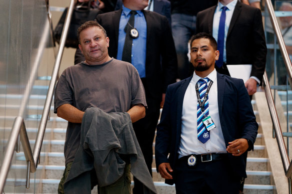Eddie Hayson arrives at Sydney Airport after his extradition from the Gold Coast following his arrest for a large commercial supply of ice and MDMA 