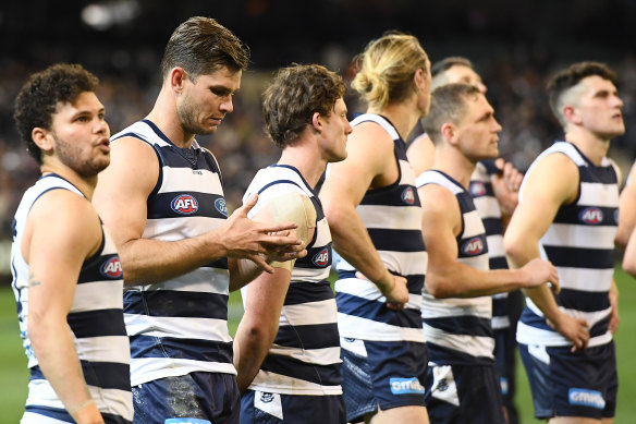 The dejected Cats after losing their qualifying final against Collingwood.