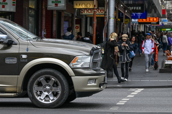 A Ram truck stopped over a pedestrian crossing in Melbourne’s CBD.