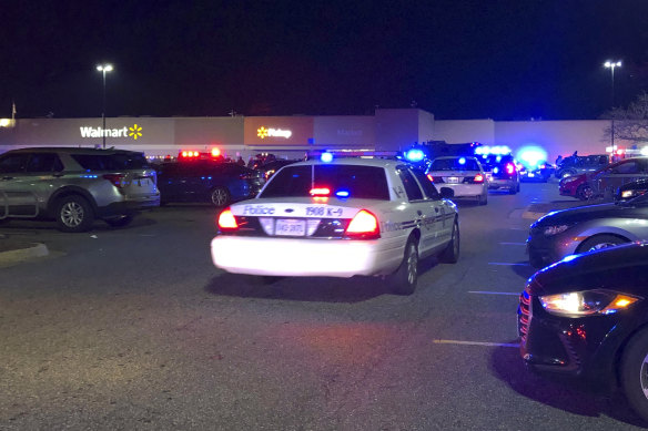 Virginia police respond to the scene of a fatal shooting at a Walmart on Tuesday night.