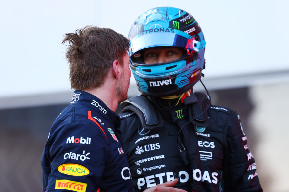 Max Verstappen and George Russell exchange words in parc ferme.