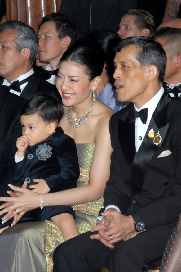 Vajiralongkorn with his third wife, Srirasmi, and their son, Dipangkorn, at Paris Fashion Week in 2007.