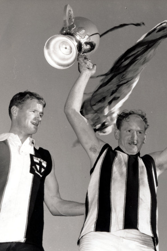 Flashback: Collingwood captain Des Tuddenham (left) and St Kilda skipper Darrel Baldock after swapping jumpers.