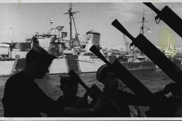 "Multiple anti-aircraft guns on the Perth, ready for dive-bombers." SMH, April 18, 1941 