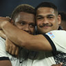 Fiji’s Ilaisa Droasese and Samuel Matavesi embrace after defeating the Wallabies.