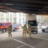Commuter chaos after truck gets stuck under train bridge