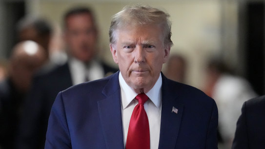 Former President Donald Trump arrives at Manhattan criminal court.