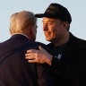 Elon Musk embraces Donald Trump during a campaign rally in October.