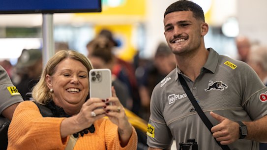 Nathan Cleary poses for a photo with a fan on Thursday.