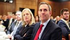 Finance Minister Katy Gallagher and Treasurer Jim Chalmers watch the PM speak on Wednesday.