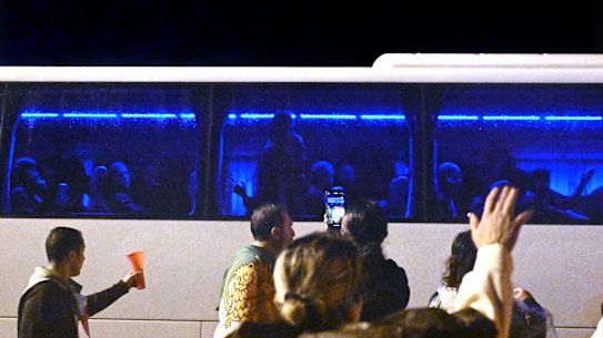 Supporters gesture to the Iranian players on the Gold Coast on Sunday night.
