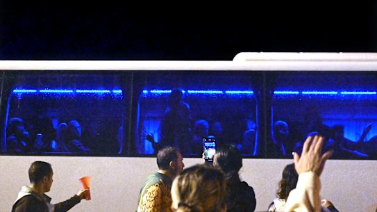 Supporters gesture to the Iranian players on the Gold Coast on Sunday night.