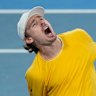 Alex de Minaur roars after securing victory against Hubert Hurkacz.