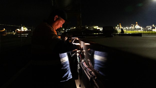 The steerer, Freddie Scheepers, checks the truck prior to the start of the turbine blade’s trip from Newcastle port to the Uungula wind farm near Wellington in NSW.