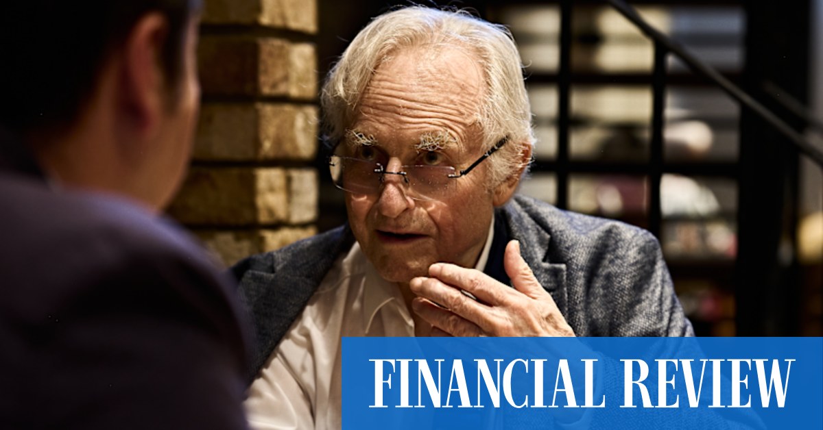 The famed British scientist has changed how the world thinks about evolution and religion. Can he and his new friend “Claudia” do the same for artificial intelligence?