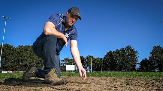 Western Eagles senior coach Dan Casey at his drought-stricken ground.