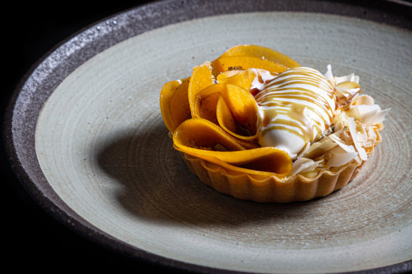 Pumpkin pie with macadamia nuts.