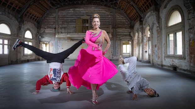 Rising artistic director Hannah Fox, centre, with breakdancers Michael Fox and Demi Sorono in the Flinders Street Station ballroom.