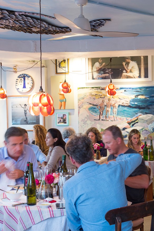 Coastal charm: Sean’s art-lined dining room.