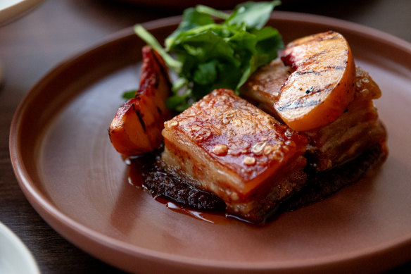 Pork belly with mole, grilled drunk peaches and mezcal molasses.