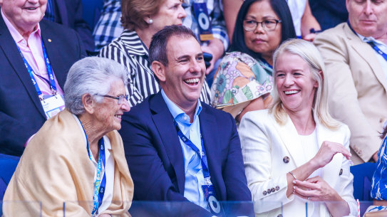 Dr Chalmers at the Australian Open men’s final on Sunday night with his wife Laura, right.