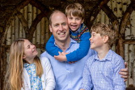 Prince William, Prince of Wales with his children Princess Charlotte, Prince Louis and Prince George (right)