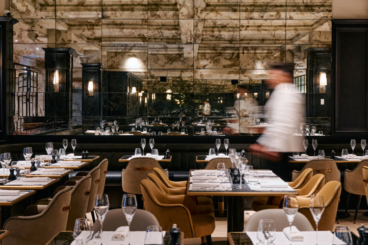 The ground-floor restaurant at Maison Batard has smoked-glass mirrors, plump velvet seats and a custom-built oyster bar.