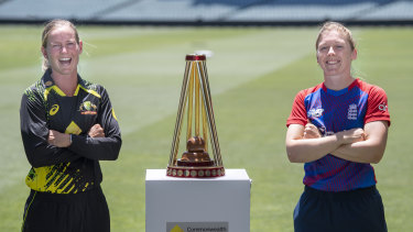 Meg Lanning (left) and Heather Knight (right) with the Women’s Ashes trophy in Adelaide on Wednesday. 