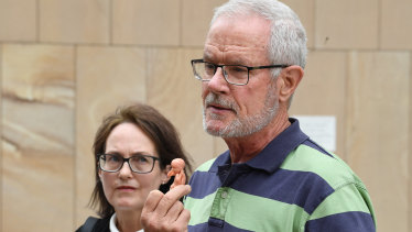 Anti-abortion protesters John Graham Preston and Kathleen Clubb outside the High Court in Brisbane on Wednesday.