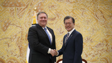 US Secretary of State Mike Pompeo, left, poses with South Korean President Moon Jae-in during a bilateral meeting at the presidential Blue House in Seoul, South Korea soon after the Singapore summit.