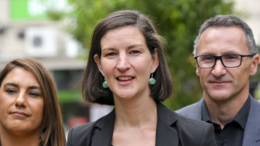 Melbourne MP Ellen Sandell, centre, with Northcote MP Lidia Thorpe and Federal Greens leader Richard Di Natale. 