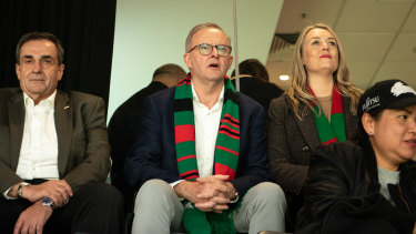 Prime Minister Anthony Albanese watches the South Sydney Rabbitohs v the Wests Tigers game with his partner Jodie Haydon and former South Sydney captain Mario Fenech at Accor Stadium on Saturday.